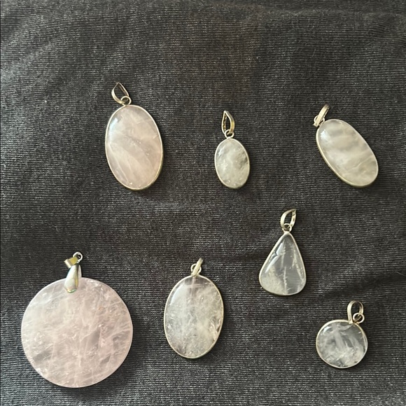 Jewelry - Lot of varying sized rose quart pendants slight damage